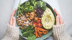 Woman,Holding,Plate,With,Vegan,Or,Vegetarian,Food.,Healthy,Plant