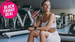 Young,Strong,Sporty,Athletic,Sportswoman,Woman,In,White,Sportswear,Earphones