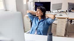 Businesswoman taking a break from work at her office
