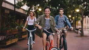 woman,bicycle,city,young,caucasian,happy,cycle,enjoying,ride,three,life,bike,road,street,casual,men,man,female,together,group,smiling,real,people,friends,lifestyle,outdoors,looking,travel,fun,women Three,Young,People,Cycling,Down,The,Street.,Male,And,Female