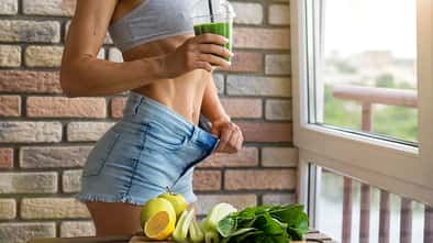 Fit,Woman,Drinking,Vegetable,Green,Detox,Smoothie.,Raw,Food,Diet