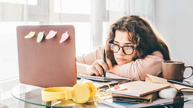 Bored,Woman,Studying,At,Home.,Student,Learning,And,Working,At