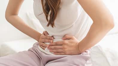 Flatulence,Ulcer,,Asian,Young,Woman,,Girl,Hands,In,Belly,,Stomach