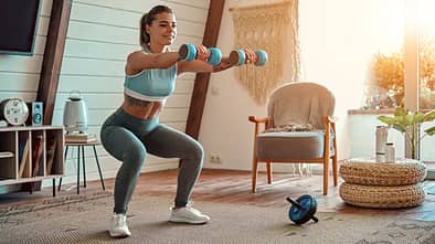 Beautiful,Young,Athletic,Girl,In,Leggings,And,Top,Crouches,With