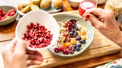 close up of healthy fruit bowl - superfood with yogurt and fruits close up of healthy fruit bowl - superfood with yogurt and fruits