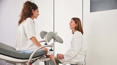 Following the gynecological exam, the patient and doctor discuss the results.
