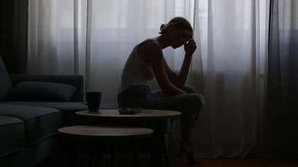 beauty,desperate,suffering,sadness,sorrow,melancholy,beautiful,s Young,Depressed,Woman,Sitting,On,The,Sofa,Next,To,The