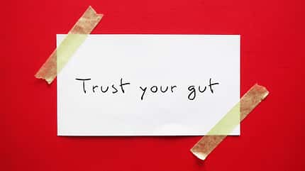 trust,deep,internal,strong,first thought,instinct,gut,faith,feel Note,Stick,On,Red,Background,With,Handwritten,Text,Trust,Your