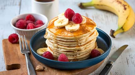 Fluffy,Buttermilk,Pancakes,With,Banana,And,Raspberry,For,Breakfast