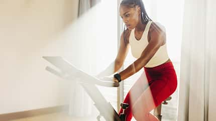 Black female athlete crushes cardio with home workout