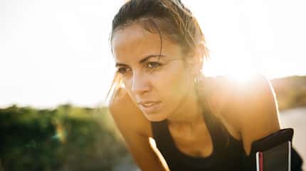 Woman having a break during workout Woman having a break during workout