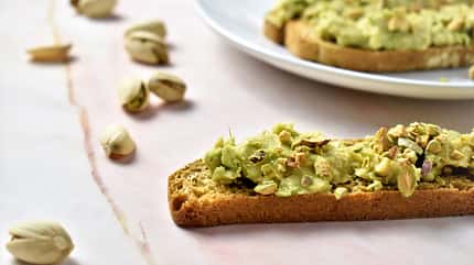Vegan toast with avocado and nuts