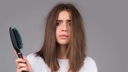 Young,Woman,Is,Very,Upset,Because,Of,Hair,Loss.,Haircut