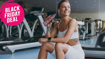 Young,Strong,Sporty,Athletic,Sportswoman,Woman,In,White,Sportswear,Earphones