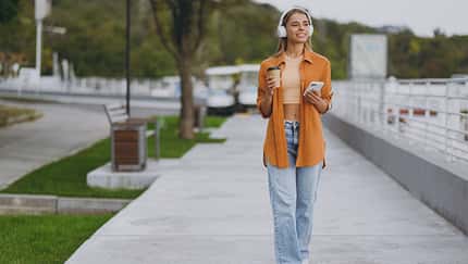 Full,Body,Young,Woman,Wear,Orange,Shirt,Casual,Clothes,Listen