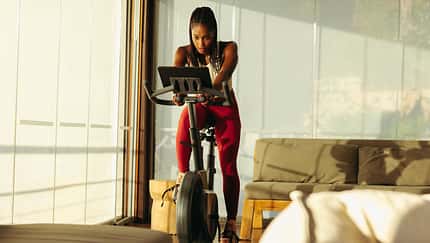 Home gym workout: Online cycling class helps black woman achieve fitness goals