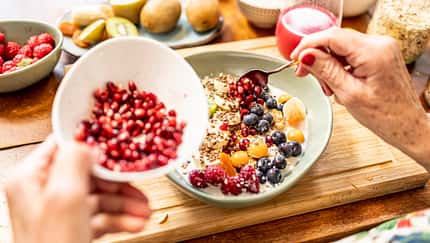 close up of healthy fruit bowl - superfood with yogurt and fruits
