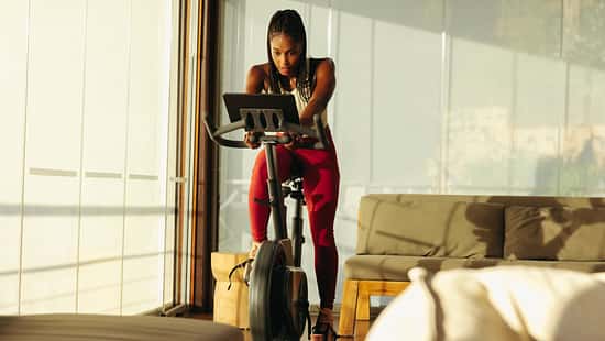 Home gym workout: Online cycling class helps black woman achieve fitness goals