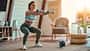 Beautiful,Young,Athletic,Girl,In,Leggings,And,Top,Crouches,With