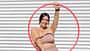 Eine kurvige Frau in Sportkleidung mit einem Hula-Hoop-Reifen
