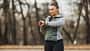 Woman Checking Fitness Tracker Outdoor Early Morning Woman Checking Fitness Tracker Outdoor Early Morning