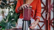 Young,Woman,Preparing,A,Healthy,Recipe,Of,Diverse,Fruits,,Watermelon,