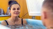 Couple,Bathing,In,The,Cold,Water,Among,Ice,Cubes,With