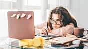 Bored,Woman,Studying,At,Home.,Student,Learning,And,Working,At