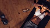Overhead,View,Of,Female,Doing,Abs,Workout,At,The,Gym.