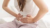Flatulence,Ulcer,,Asian,Young,Woman,,Girl,Hands,In,Belly,,Stomach