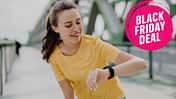 Young,Woman,Checking,Smartwatch,In,City,,Preparing,For,Run,,Healthy
