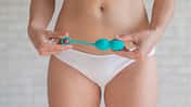 Faceless,Woman,In,White,Panties,Holding,The,Kegel,Trainer,For