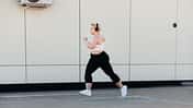 Side,View,Of,A,Woman,With,Plus,Size,Body,Running