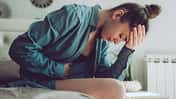 Sad,,Unhappy,Woman,Suffering,From,Pms,And,Menstruation,Pain.,Having