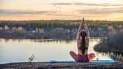 Girl,On,A,Rug,In,The,Forest,Does,Yoga