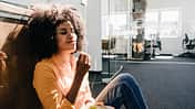 Young woman having a break in office