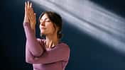 Serene Woman Practicing Yoga in a Peaceful Environment