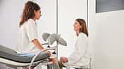 Following the gynecological exam, the patient and doctor discuss the results.